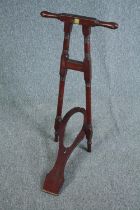 A 19th century mahogany free standing boot jack. H.86cm.