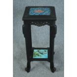 A late 19th century Chinese hardwood jardiniere stand with inset tiles to the top and undertier. H.
