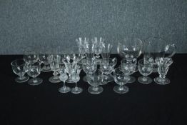 A collection of 19th and early 20th century glasses, including a set of six handled posset glasses