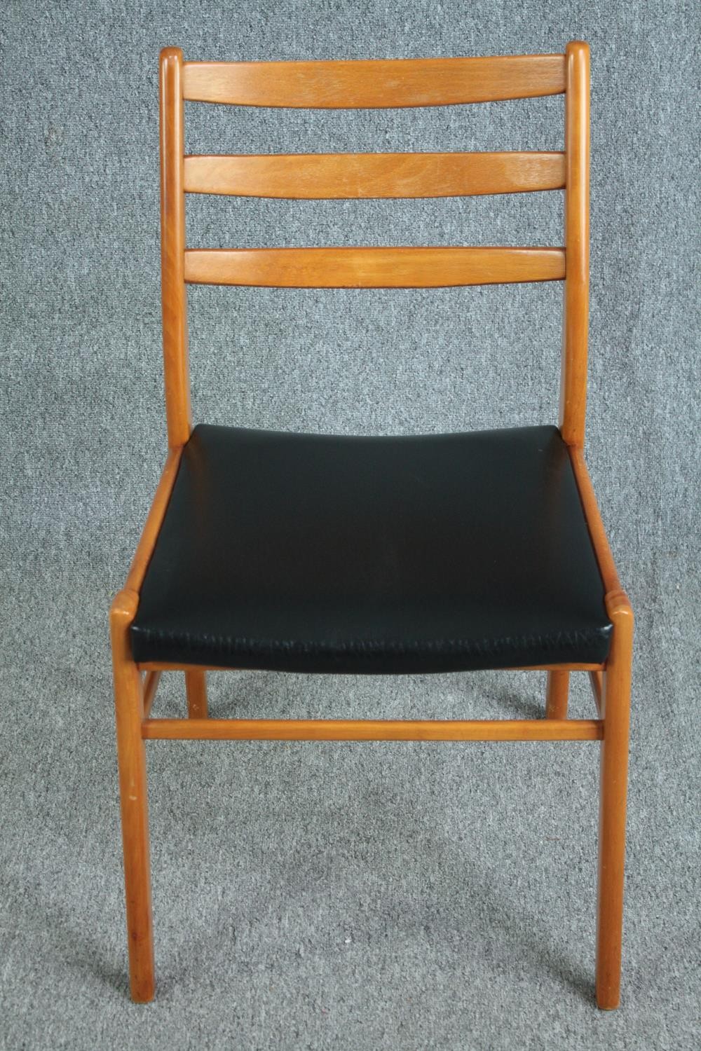 A set of six mid century vintage dining chairs in light beech and faux leather seats. - Image 2 of 5