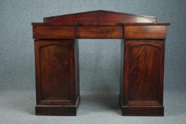 Dwarf pedestal sideboard, mid 19th century flame mahogany, in three sections. H.111 W.136 W.54cm.