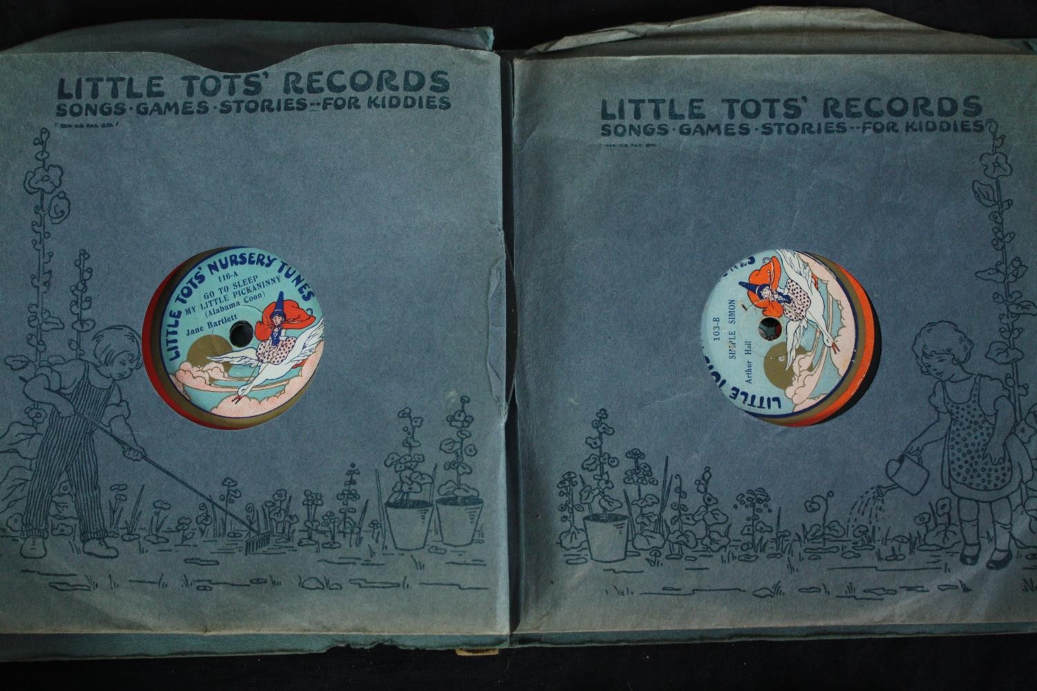 A children's or nursery gramophone record player with a collection of nursery rhyme records. 78 rpm. - Image 11 of 15