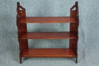 A late 19th century mahogany open hanging bookcase. H.66 W.62 D.17cm.