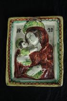 A ceramic Madonna and child icon. Dated 1832. H.34 W.34cm.