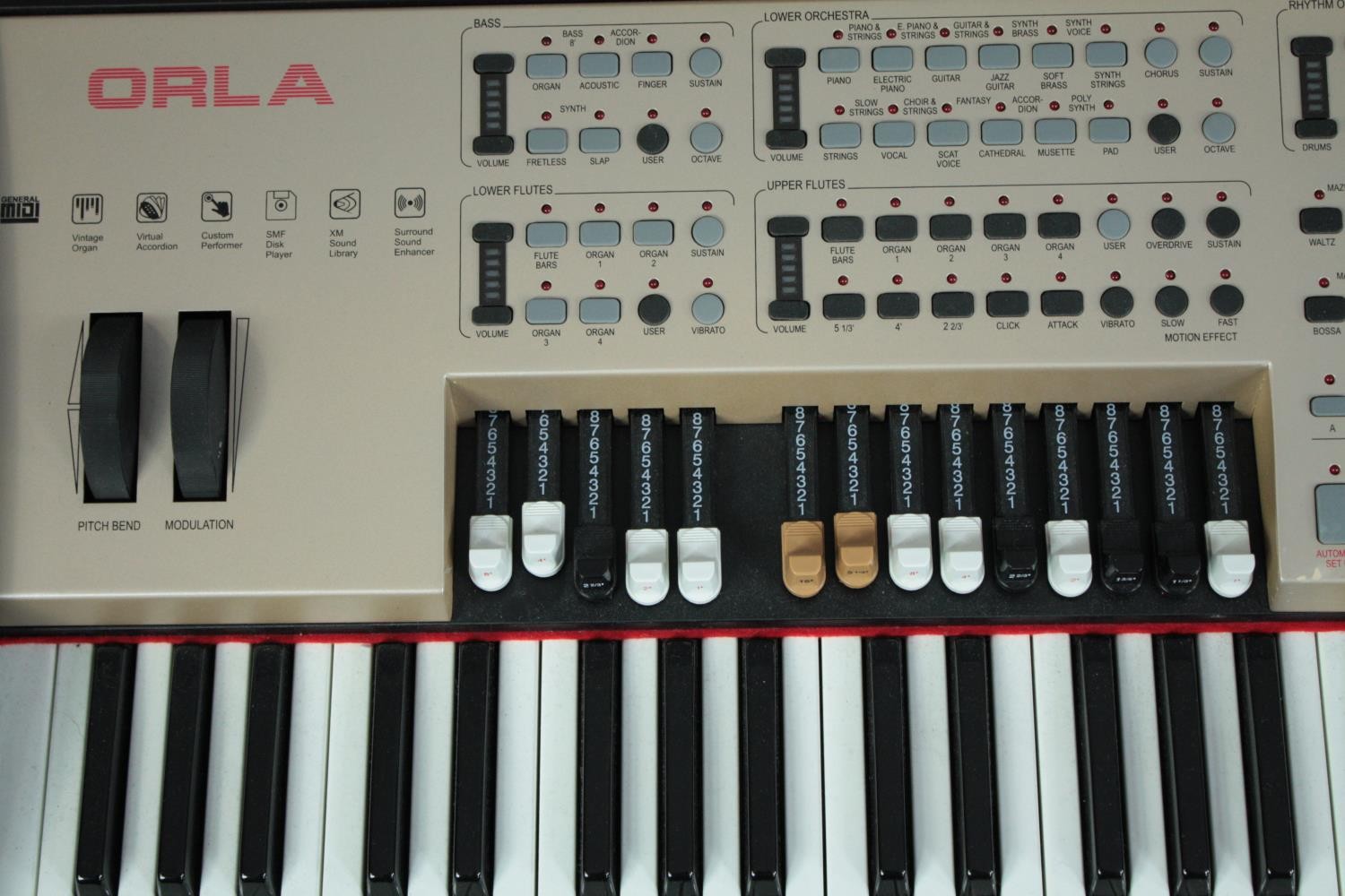 The Orla KX1000 organ complete with all its pedals and manual. In sturdy inflight case. L.120 W.54 - Image 3 of 8