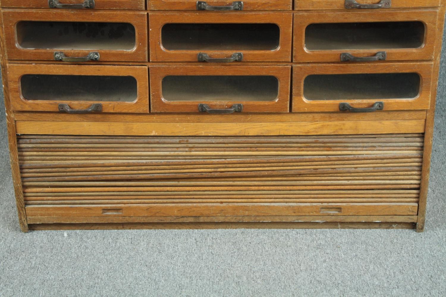 A mid century vintage draper's shop cabinet, full height with a bank of thirty glazed drawers. H.193 - Image 5 of 8