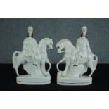 A pair of large Staffordshire porcelain flatback figures. Kilted Scotsman on horseback. H.39cm. (
