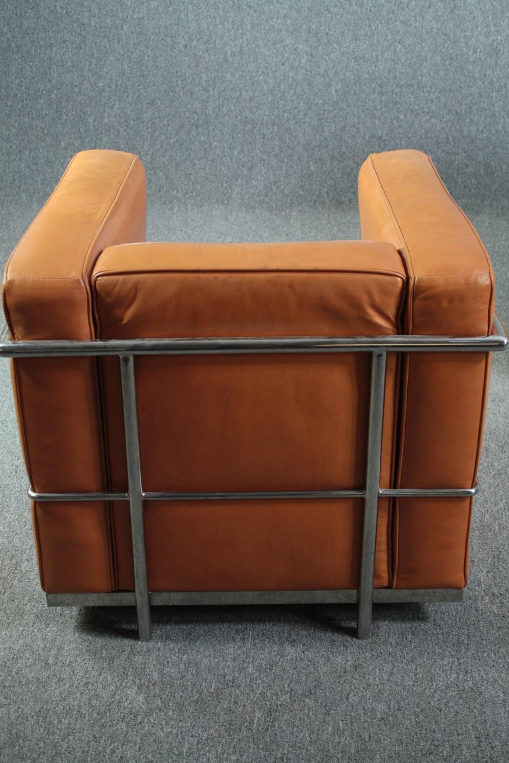 After Le Corbusier, a pair of LC2 armchairs upholstered in light tan leather. H.56 W.76 D.70cm. ( - Image 8 of 9