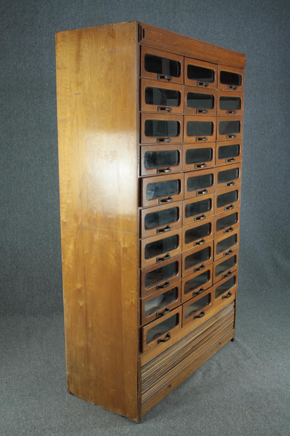 A mid century vintage draper's shop cabinet, full height with a bank of thirty glazed drawers. H.193 - Image 2 of 8