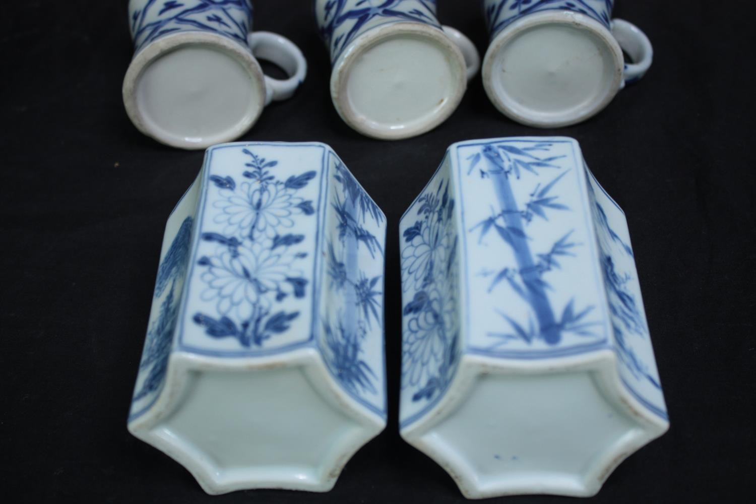 A mixed collection of blue and white Chinese porcelain including a teapot and vases. Signed on the - Image 12 of 12