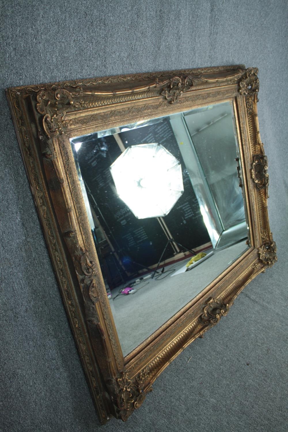 A large mirror with bevelled plate in a foliate gilt decorated frame. H.229 W.160 cm. - Image 3 of 5