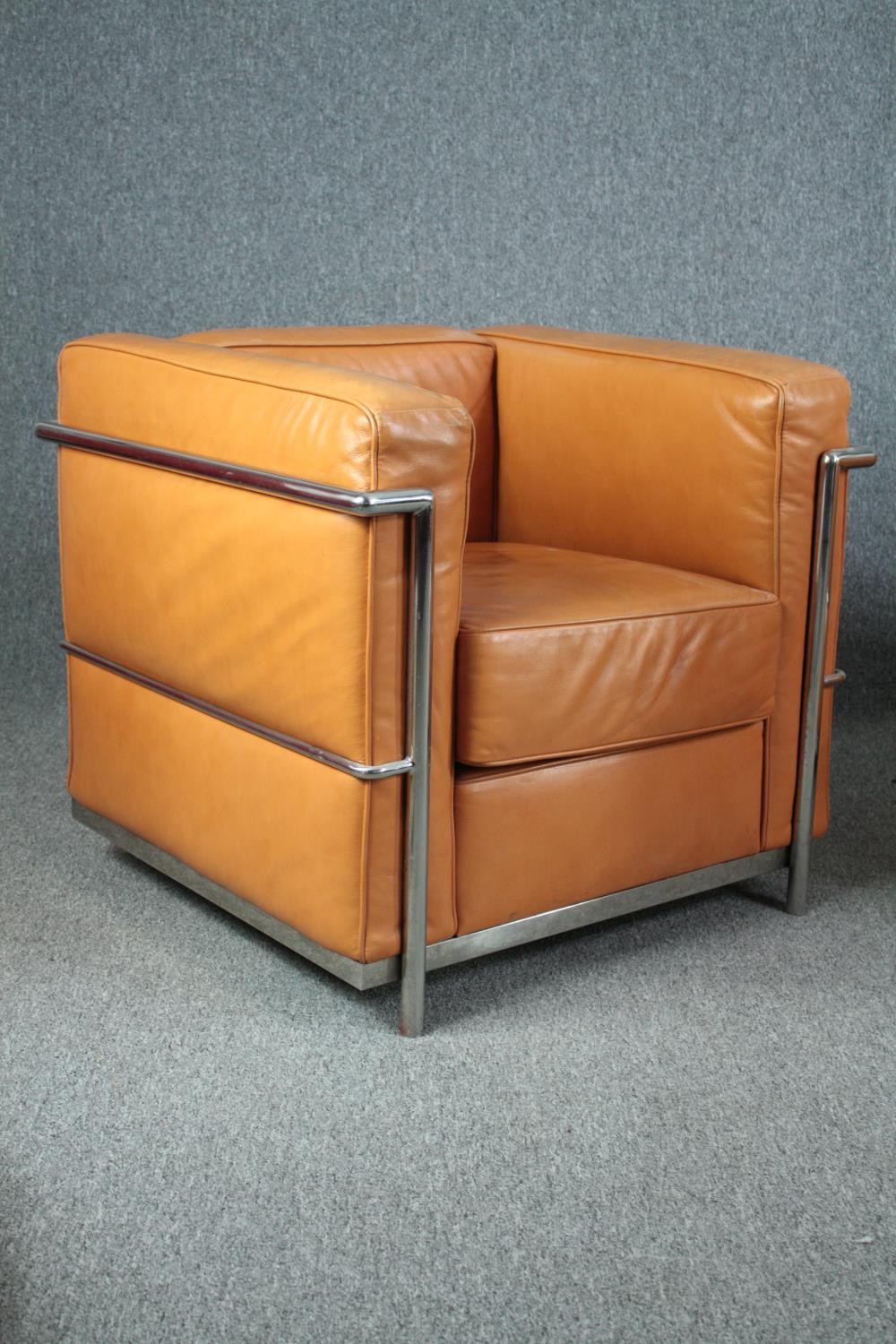 After Le Corbusier, a pair of LC2 armchairs upholstered in light tan leather. H.56 W.76 D.70cm. ( - Image 5 of 9