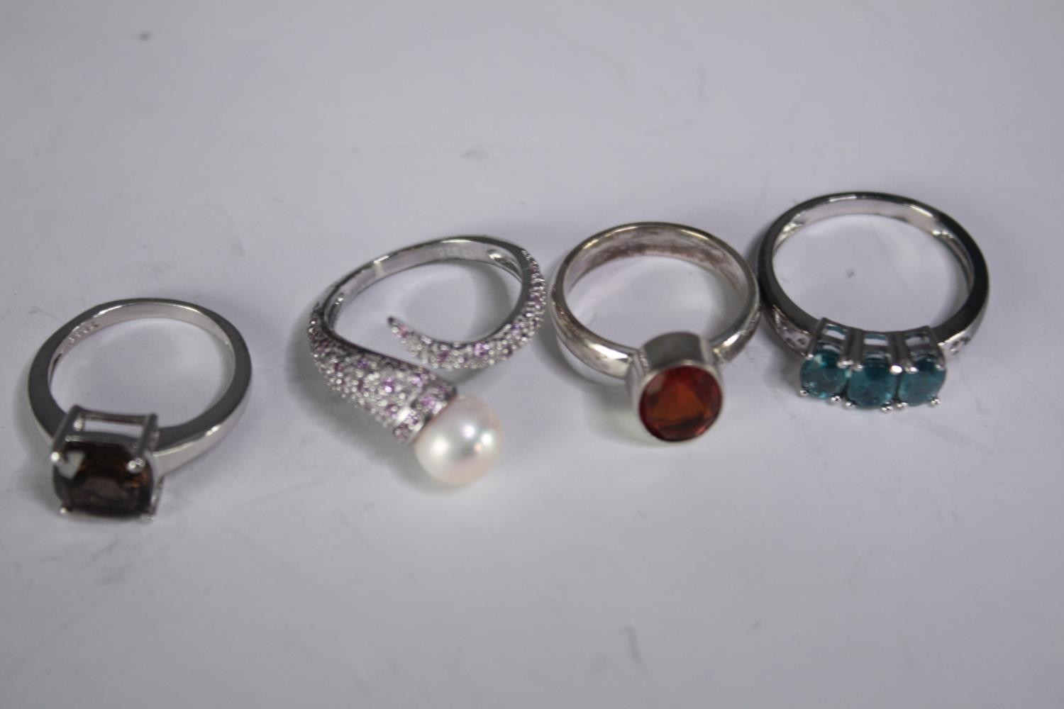 A collection of ten silver gem-set rings of various designs. Set with Fire opal, Turquoise, - Image 4 of 5