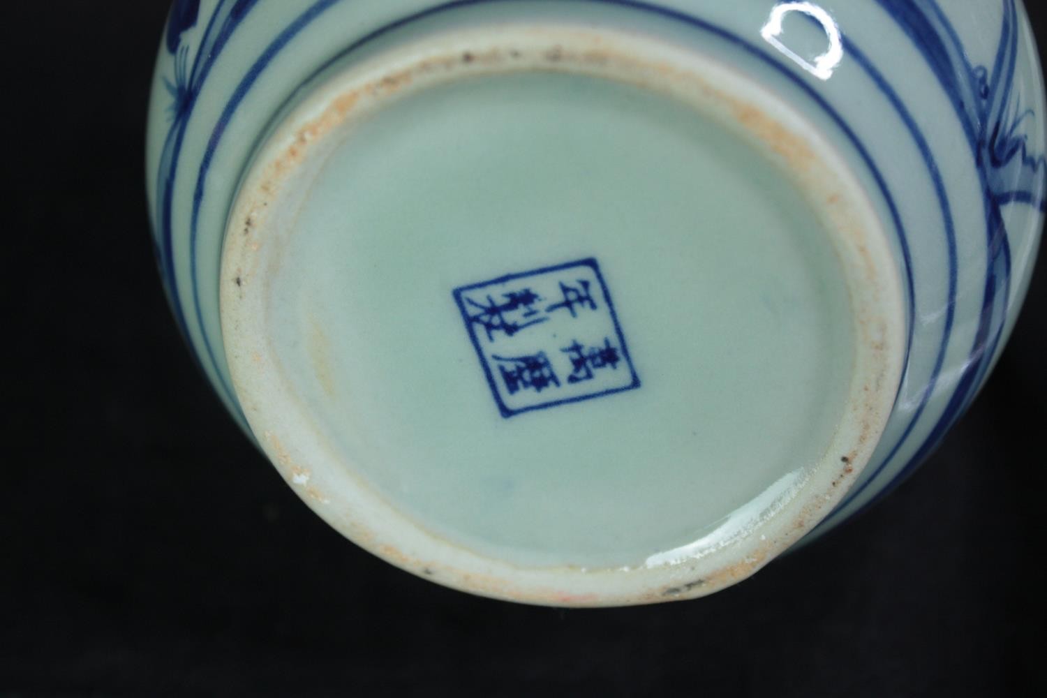 A mixed collection of blue and white Chinese porcelain including a teapot and vases. Signed on the - Image 10 of 12