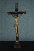 A 19th century carved Crucifix with 'INRI' painted on the top. The wood and plaster. The figure is