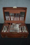 A set of silver plated cutlery made in Sheffield. Housed in a walnut case. Mid twentieth century.