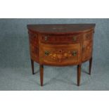 A demi lune walnut and satinwood strung cabinet with Dutch marquetry style floral inlay. H.82 W.