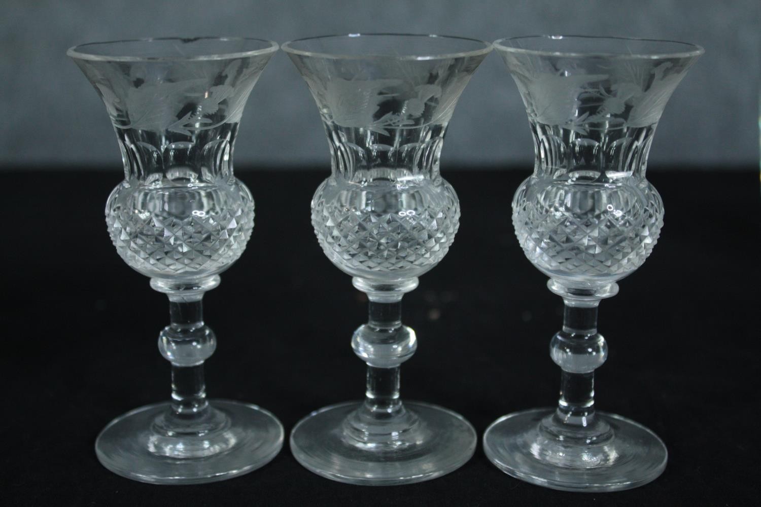 A matching pair of decanters and six small ornate sherry glasses. Twentieth century. H.24cm. ( - Image 5 of 5