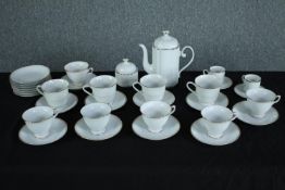 Tea and coffee set. Made in China for export. Ten cups and saucers, two coffee cups, seven side