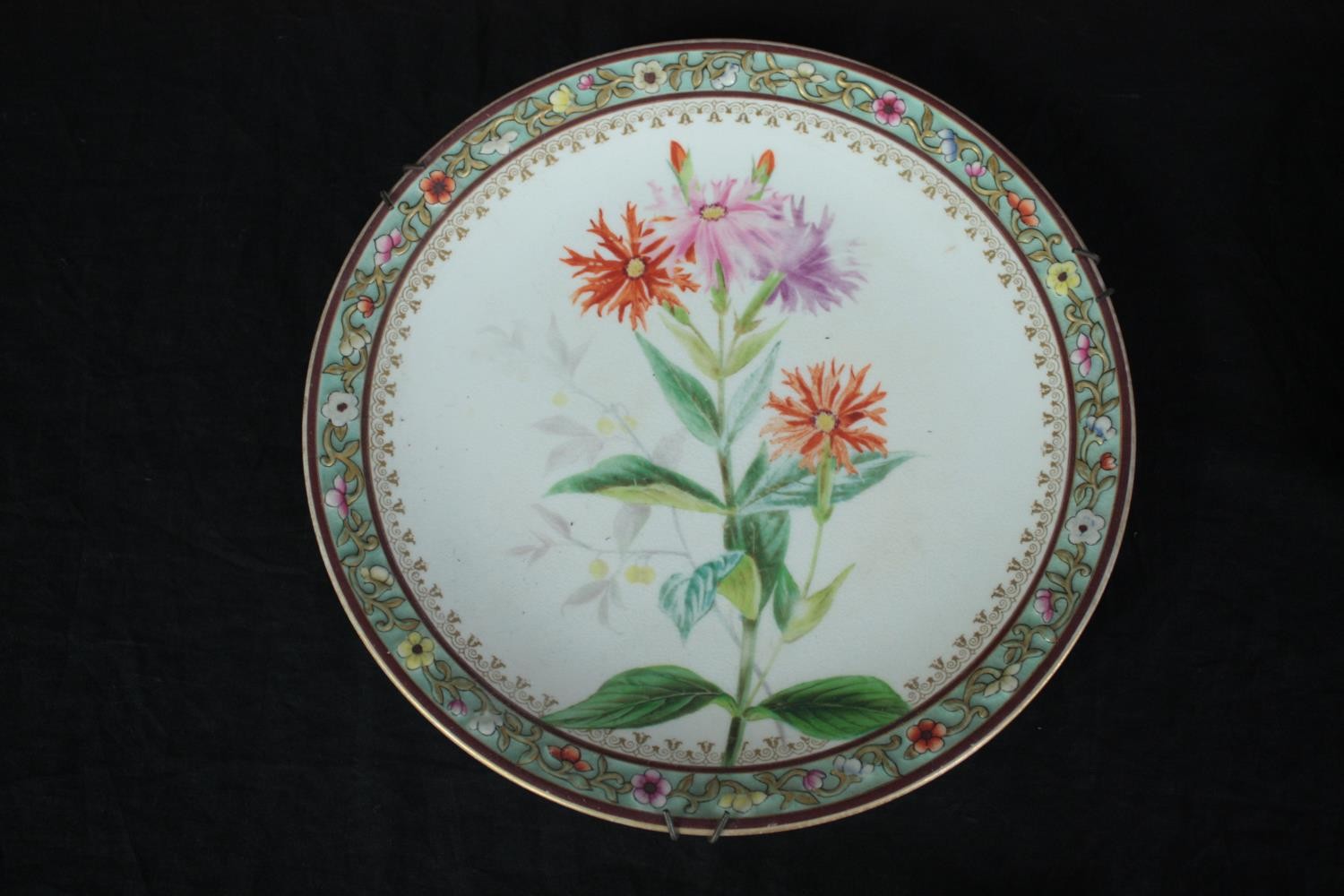 Seven nineteenth century hand painted plates. Decorated in intricate floral relief pattern running - Image 3 of 11