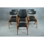 Dining chairs, a set of six vintage beechwood in faux leather upholstery.