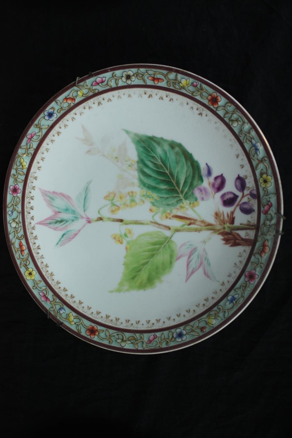 Seven nineteenth century hand painted plates. Decorated in intricate floral relief pattern running - Image 4 of 11