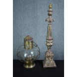 A decorative resin desk lamp and a glass cased candle holder with a brass base and lid. H.64 cm (