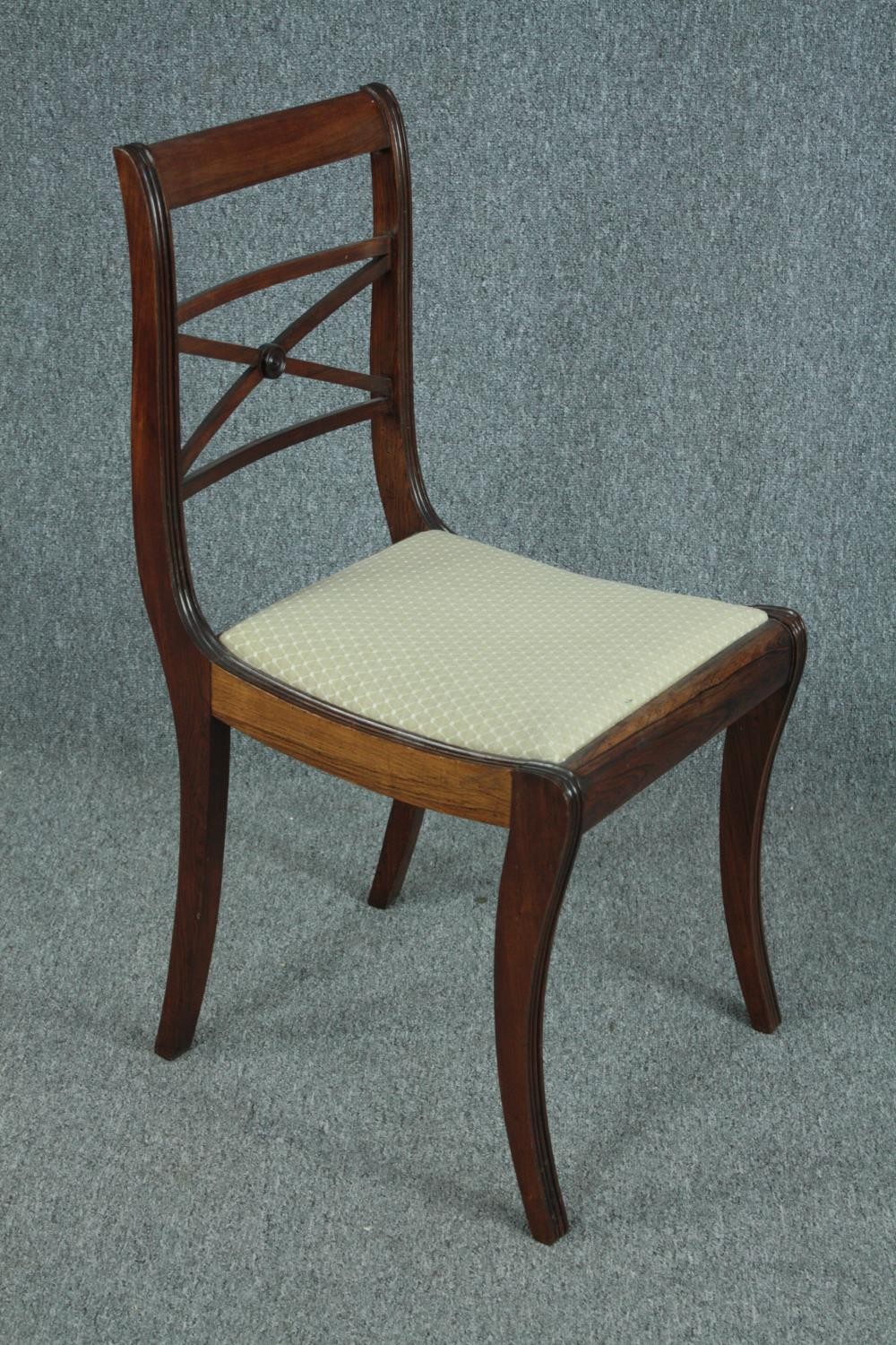 Dining chairs, a set of six 19th century rosewood on sabre supports. - Image 3 of 5