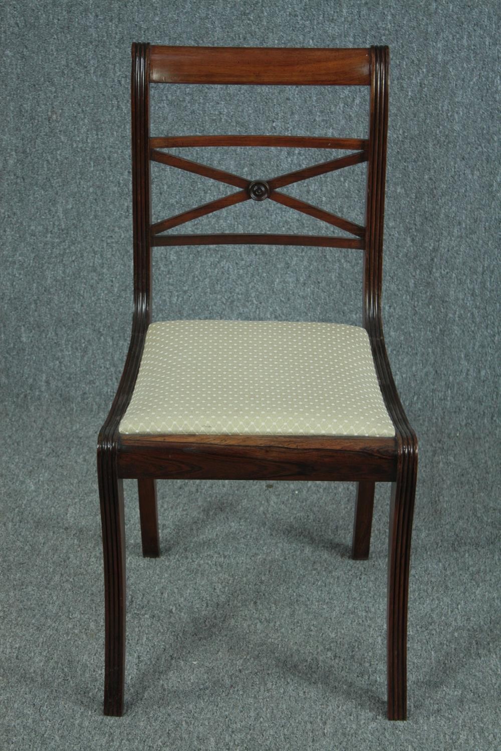 Dining chairs, a set of six 19th century rosewood on sabre supports. - Image 2 of 5