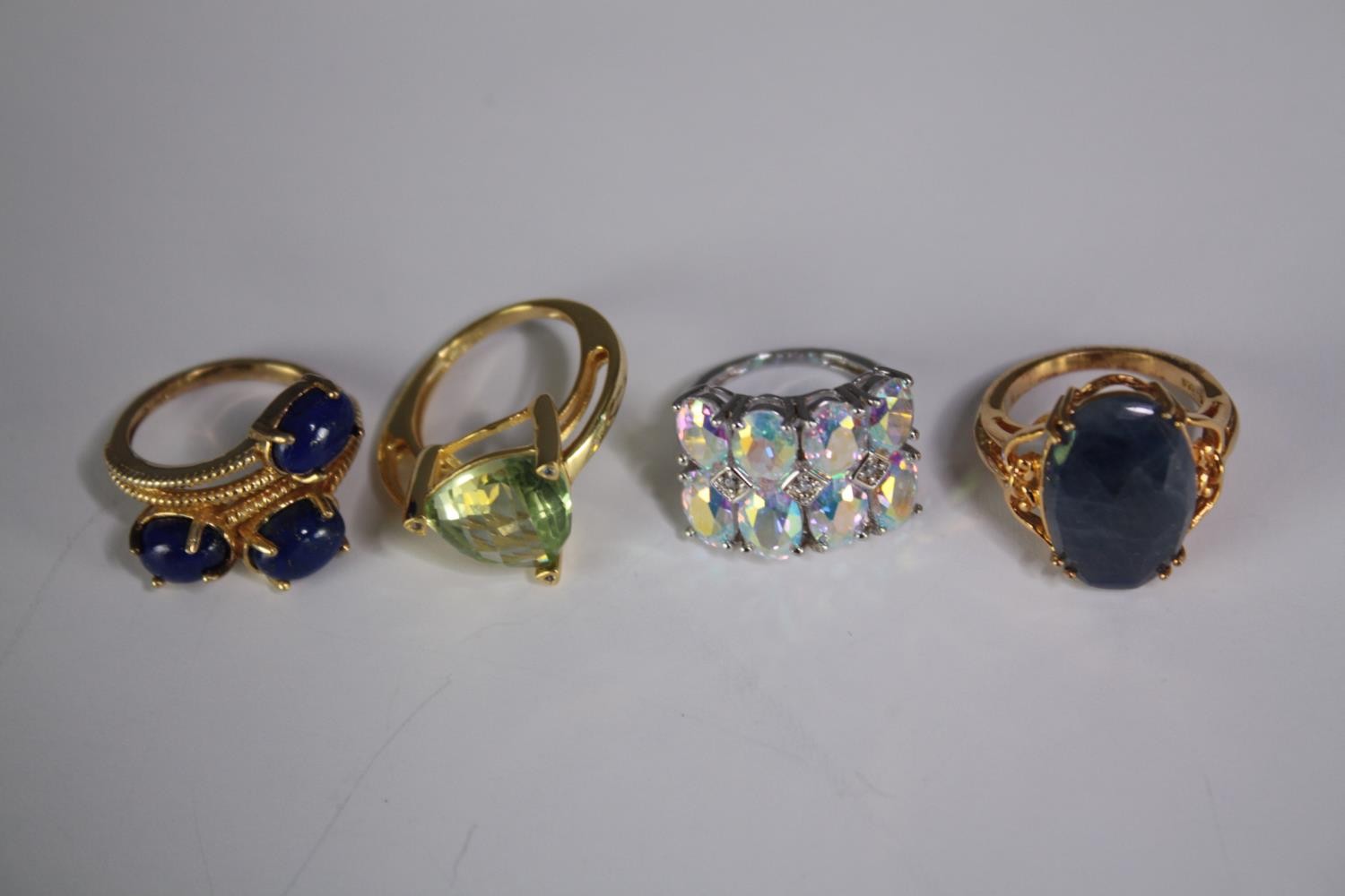 A collection of ten silver gem-set rings of various designs. Set with peridot, Black opal, - Image 4 of 4