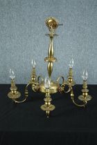 A modern brass chandelier with five branches of lights. H.47 Dia.50cm.