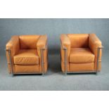 After Le Corbusier, a pair of LC2 armchairs upholstered in light tan leather. H.56 W.76 D.70cm. (