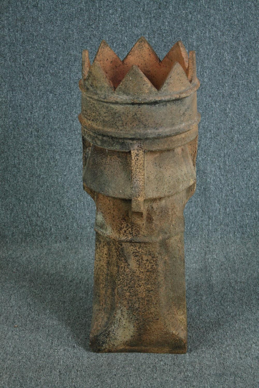 A 19th century terracotta chimney pot. H.88 Dia.30cm.