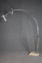 A vintage chrome five arm arc lamp on a Travertine marble base. H.205cm.