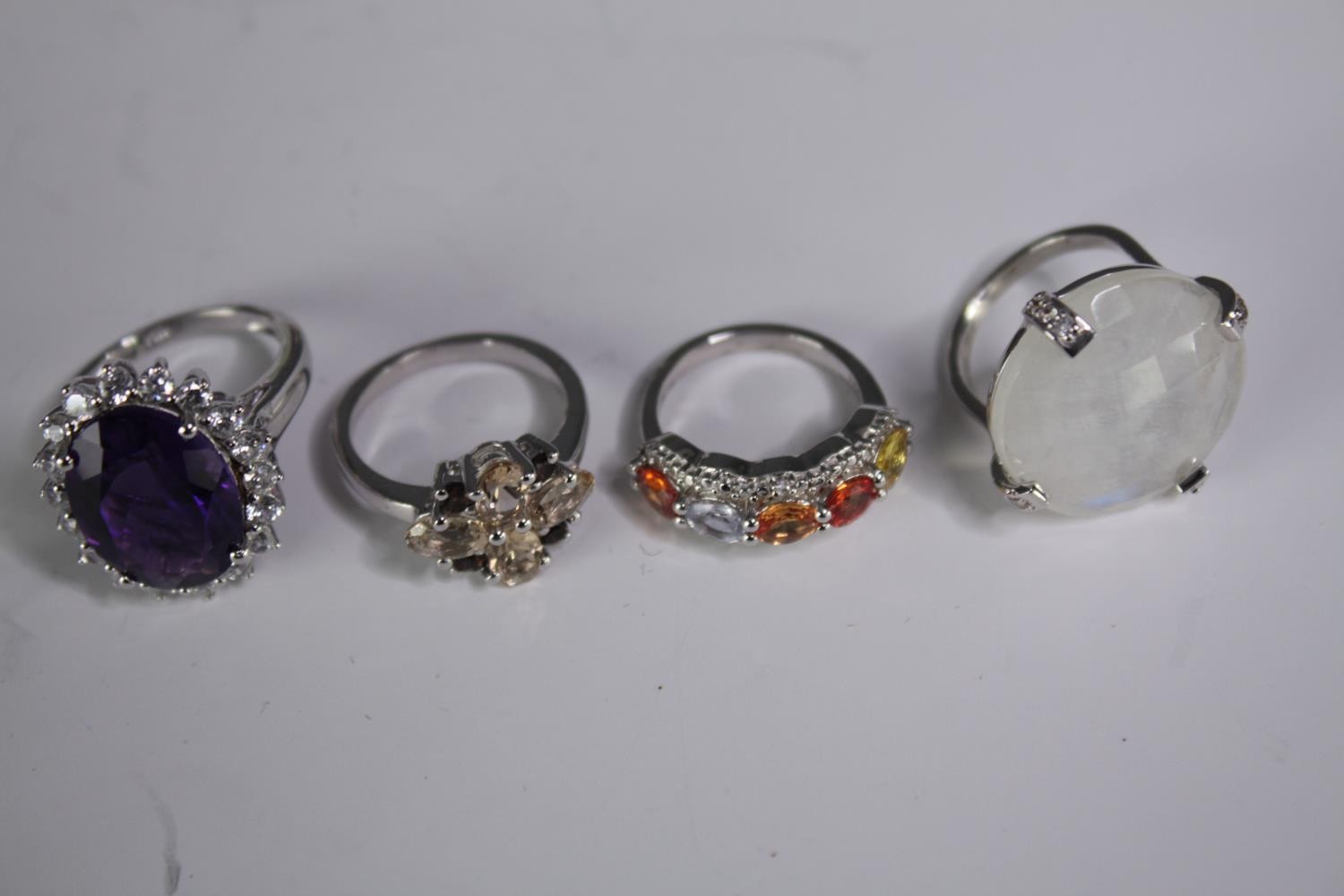 A collection of ten silver gem-set rings of various designs. Set with orange sapphire, Turquoise, - Image 3 of 5