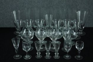 A mixed collection of stemmed glasses including six Kosta Boda highball glasses. H.19cm. (largest)