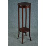 An Edwardian jardiniere stand, mahogany with satinwood inlay. H.95 Dia.31cm.