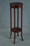 An Edwardian jardiniere stand, mahogany with satinwood inlay. H.95 Dia.31cm.