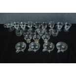 A collection of vintage mixed glass. Including cups with handles and light etched patterns. H.