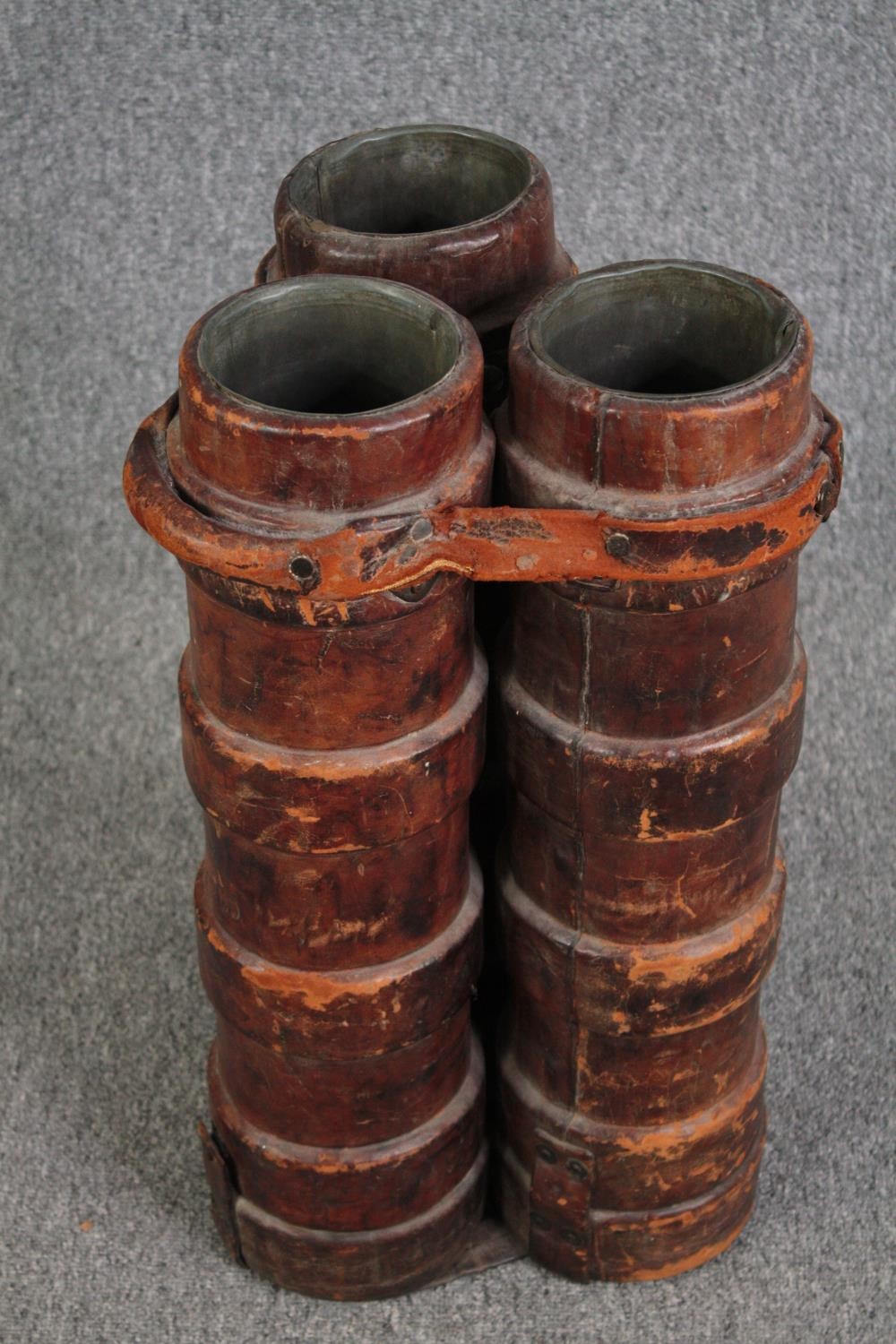 Three World War One moulded leather artillery shell cases. Each lined with lead. Bound by a - Image 2 of 5