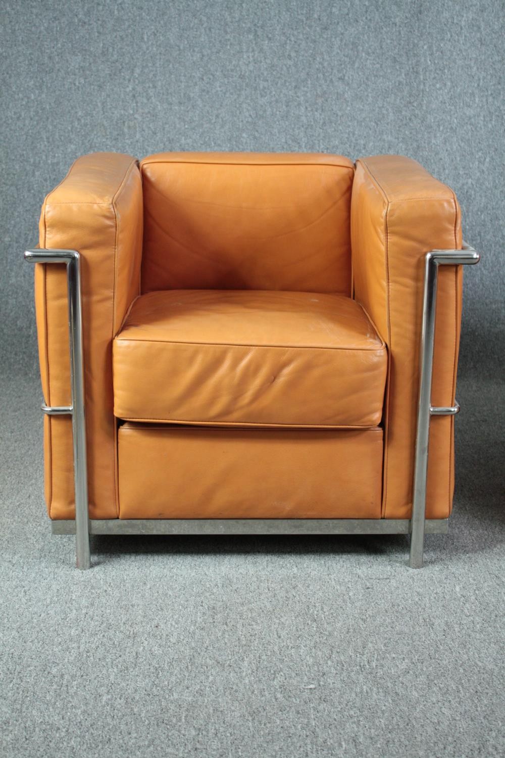 After Le Corbusier, a pair of LC2 armchairs upholstered in light tan leather. H.56 W.76 D.70cm. ( - Image 3 of 9