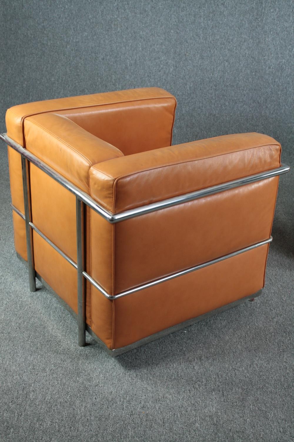 After Le Corbusier, a pair of LC2 armchairs upholstered in light tan leather. H.56 W.76 D.70cm. ( - Image 6 of 9