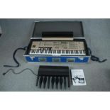 The Orla KX1000 organ complete with all its pedals and manual. In sturdy inflight case. L.120 W.54