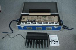 The Orla KX1000 organ complete with all its pedals and manual. In sturdy inflight case. L.120 W.54