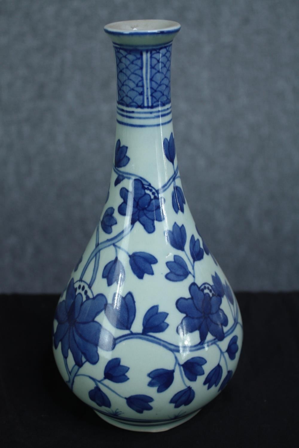 A mixed collection of blue and white Chinese porcelain including a teapot and vases. Signed on the - Image 3 of 12