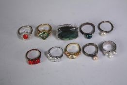 A collection of ten silver gem-set rings of various designs. Set with Labradorite, Fire opal,