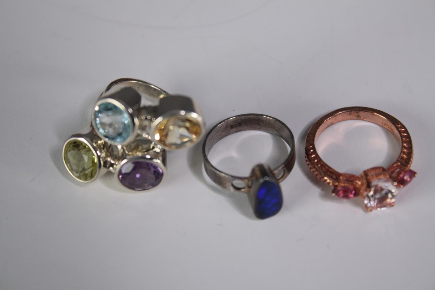 A collection of ten silver gem-set rings of various designs. Set with peridot, Black opal, - Image 3 of 4