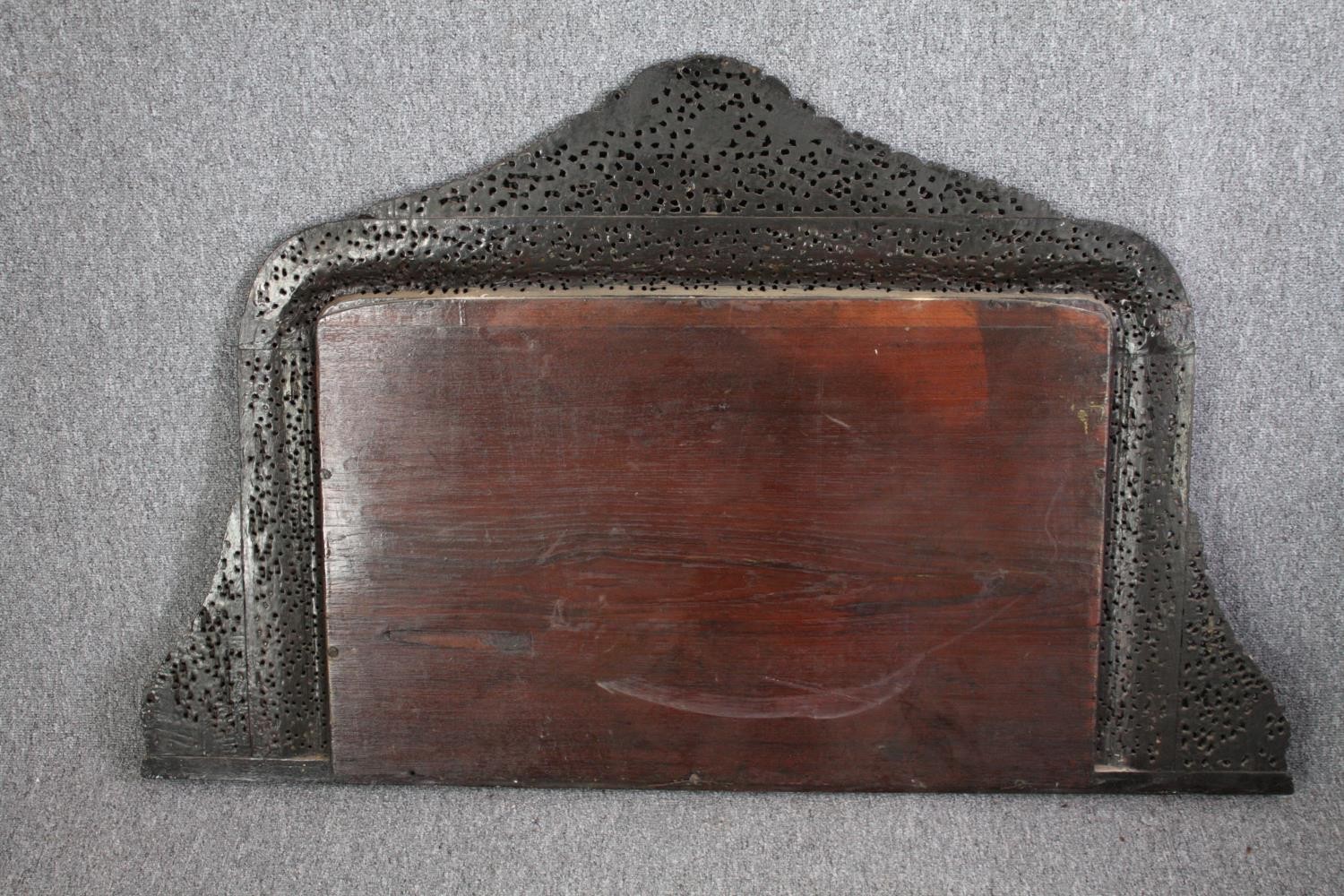 Over mantle carved Burmese hardwood mirror. H.80 W.127cm. - Image 4 of 4