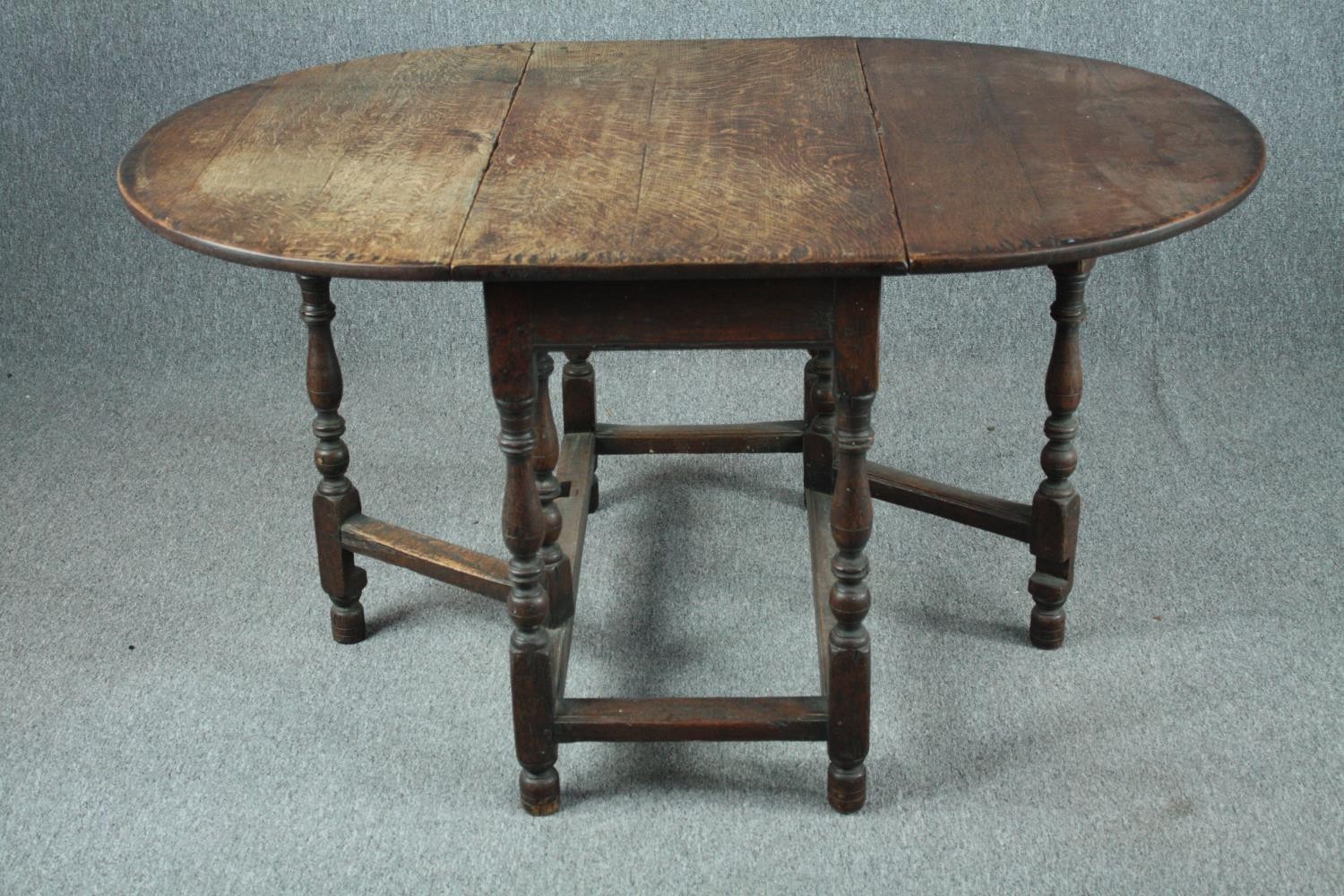 Dining table, mid century oak in the antique style. H.72 W.137 D.92cm. (extended) - Image 5 of 7