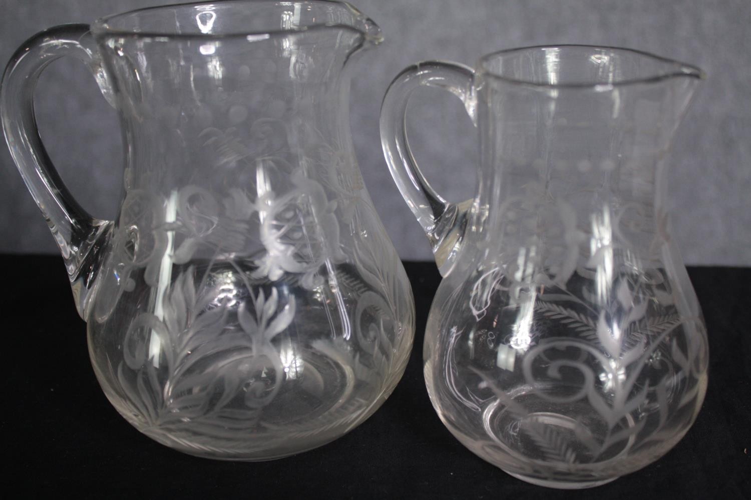 An assortment of mixed glass. Including sherry, wine and shot glasses and two jugs. H.28cm. ( - Image 6 of 6